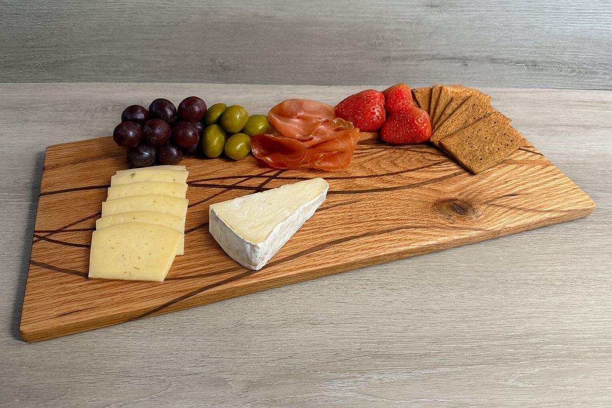 Red Oak with strips of Walnut, Mahogany & Sapele Cutting Board