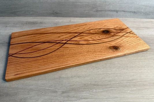 Red Oak with strips of Walnut, Mahogany & Sapele Cutting Board